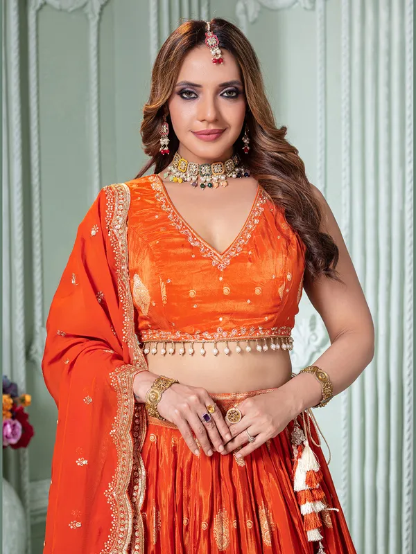 Orange crepe silk lehenga choli for occasions