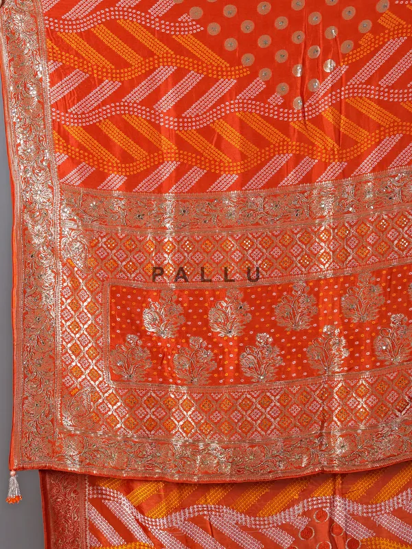 Orange dola silk saree with bandhej print