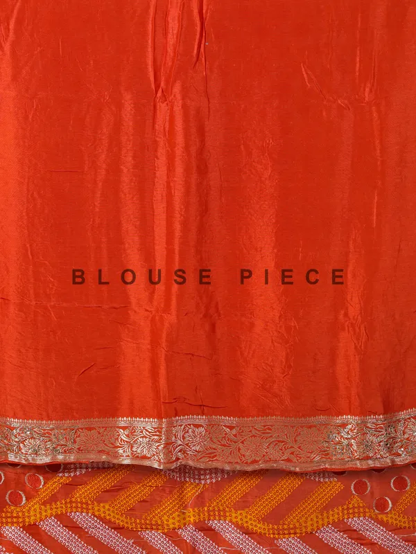 Orange dola silk saree with bandhej print