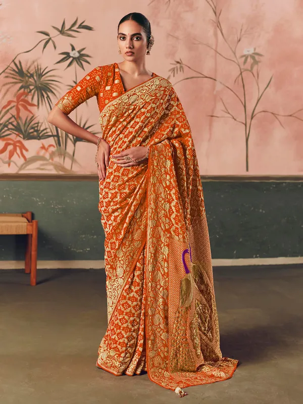 Orange georgette bandhej zari woven festive saree