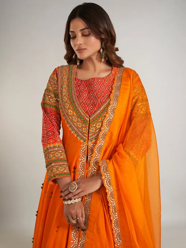 Orange georgette jacket style lehenga suit