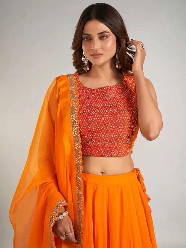 Orange georgette jacket style lehenga suit