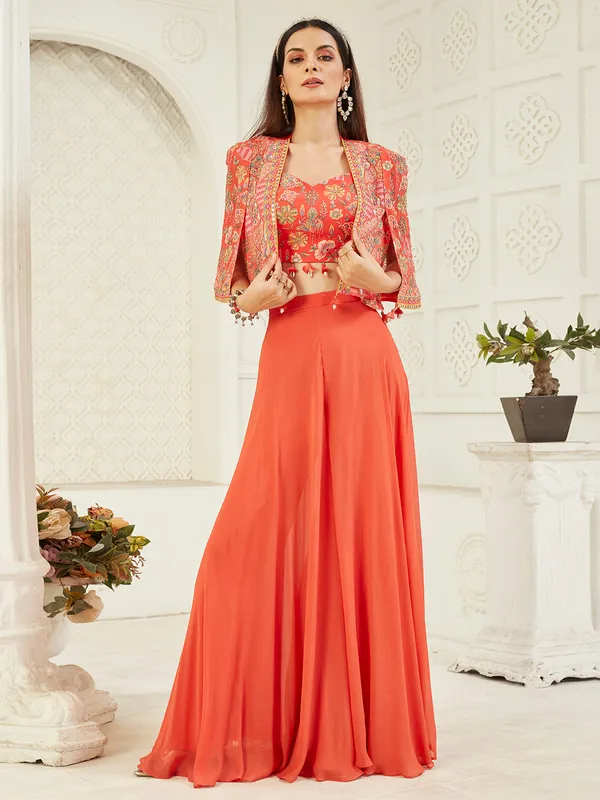 Orange georgette jacket suit with festive detailing