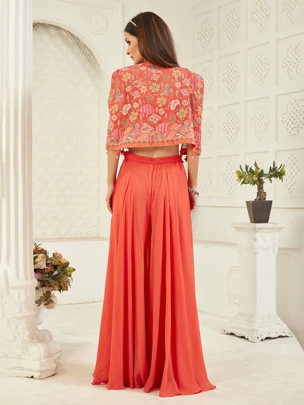 Orange georgette jacket suit with festive detailing