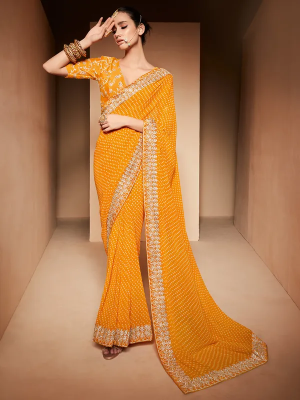 Orange georgette wedding wear saree