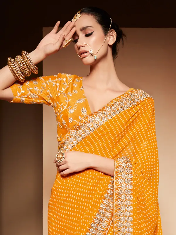 Orange georgette wedding wear saree