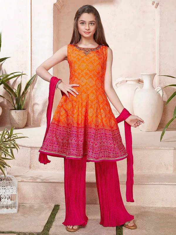 Orange hued bandhej print silk palazzo suit