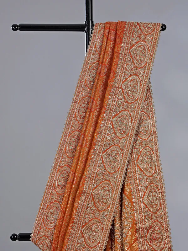 Orange kanjivaram silk blouse with regal zardosi work
