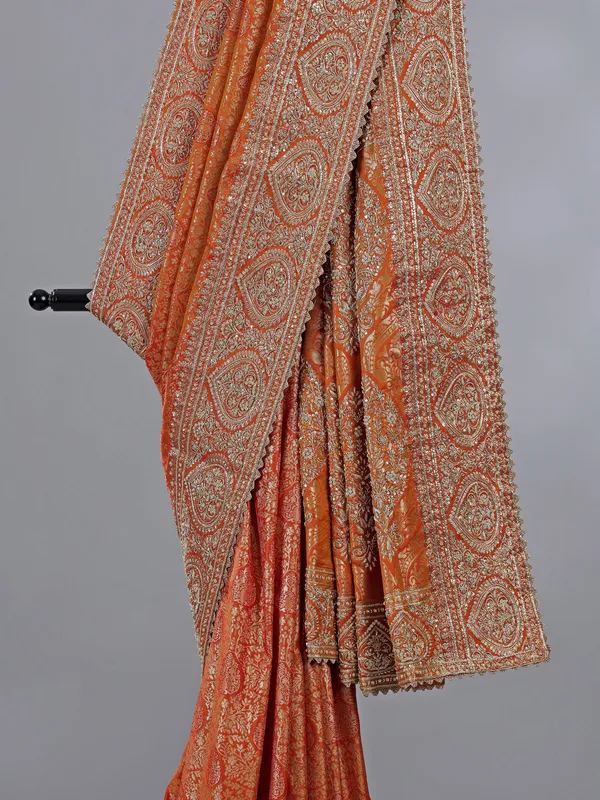 Orange kanjivaram silk blouse with regal zardosi work