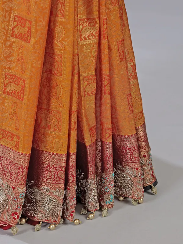 Orange kanjivaram silk saree with unstitched blouse piece