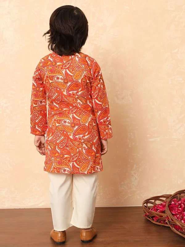 Orange kurta suit in printed pattern for festive wear