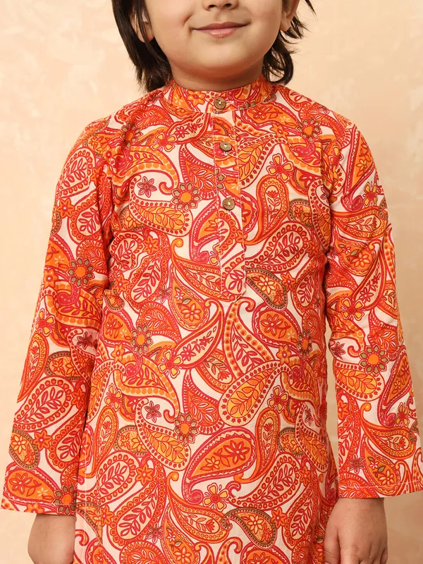 Orange kurta suit in printed pattern for festive wear