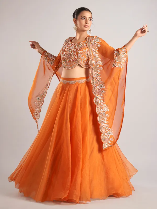 Orange organza shrug lehenga choli with heavy resham work