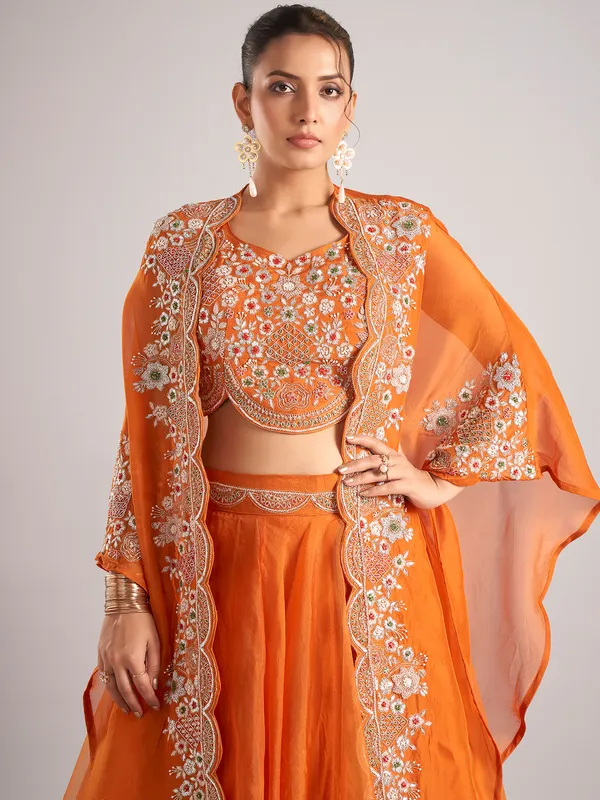 Orange organza shrug lehenga choli with heavy resham work