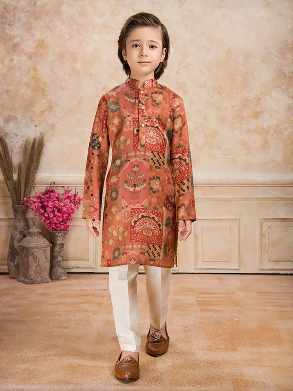 Orange printed festive wear cotton silk kurta suit