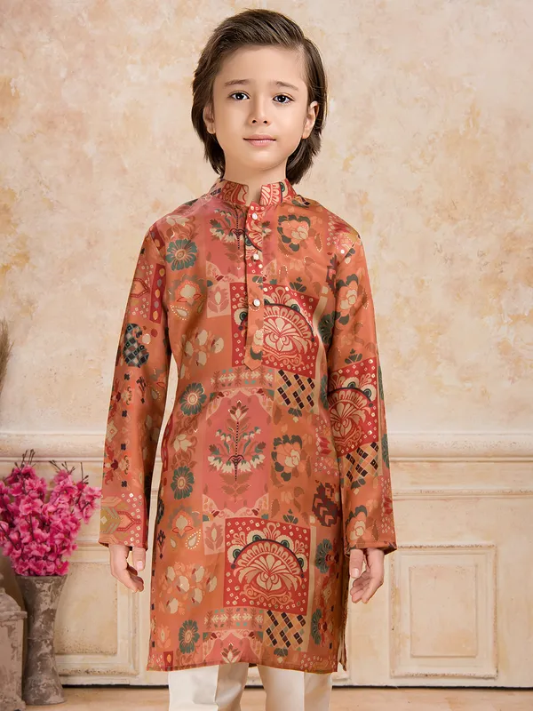 Orange printed festive wear cotton silk kurta suit