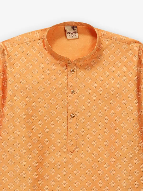 Orange printed kurta suit in cotton silk