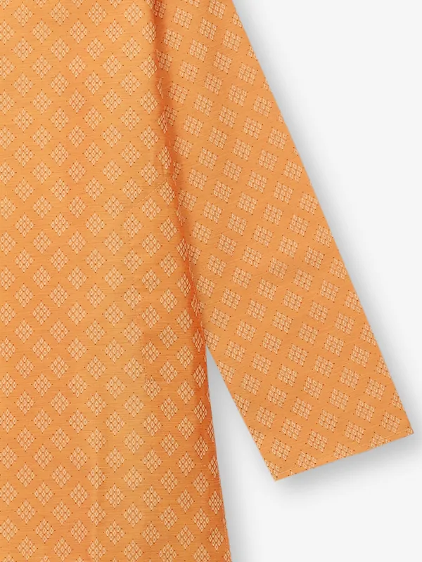 Orange printed kurta suit in cotton silk