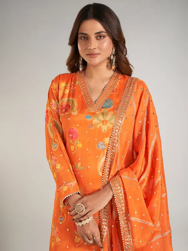 Orange printed silk palazzo suit with dupatta