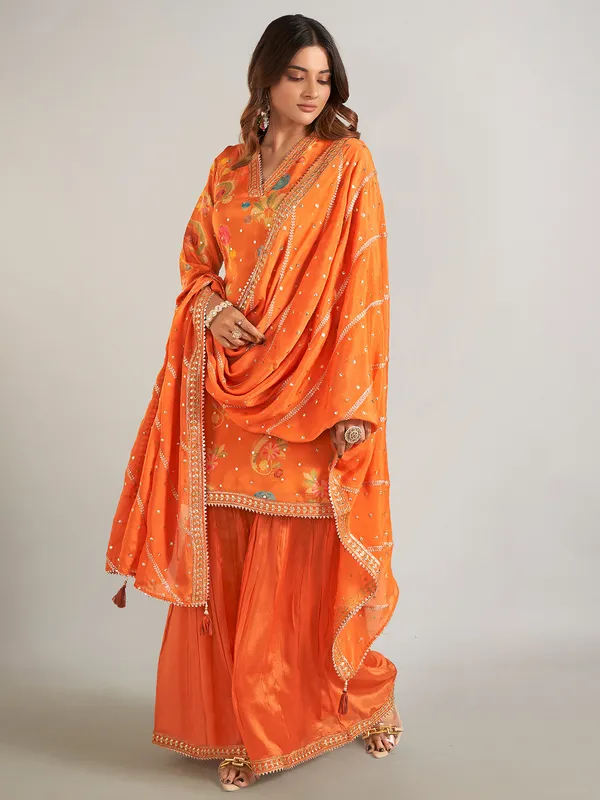Orange printed silk palazzo suit with dupatta