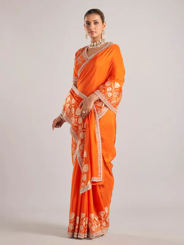 Orange pure dola silk saree with festive detailing