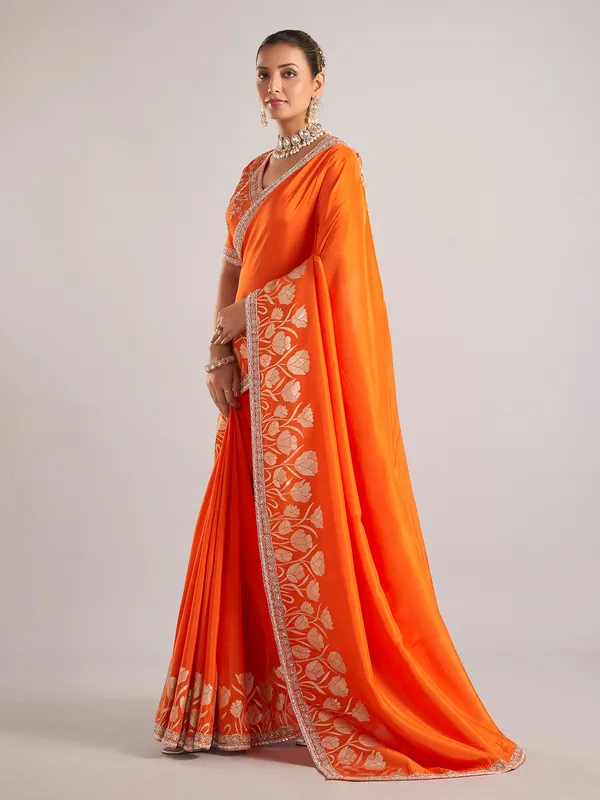 Orange pure dola silk saree with festive detailing