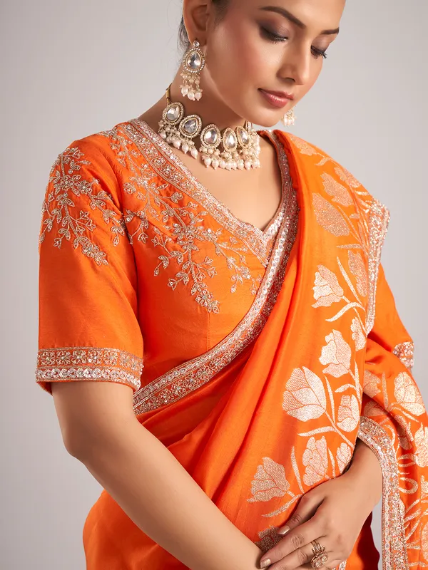 Orange pure dola silk saree with festive detailing