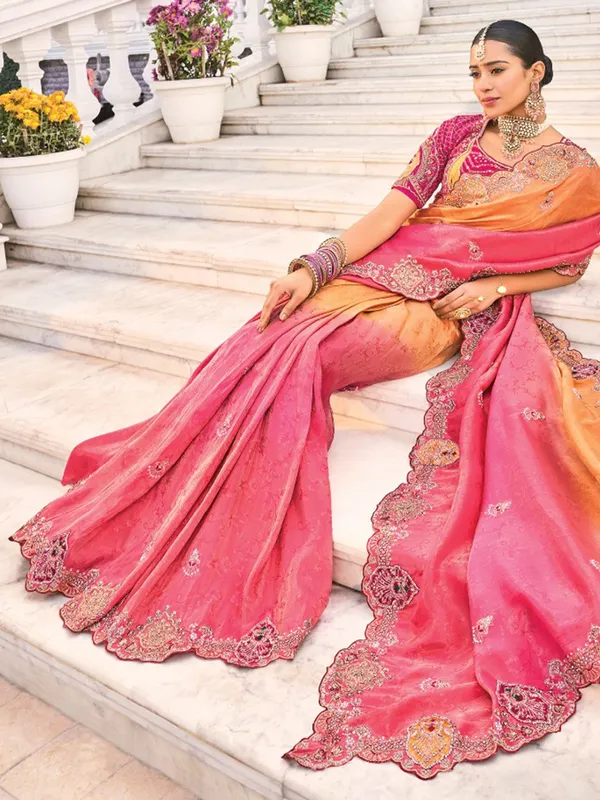 Orange rani crape saree for grand celebrations