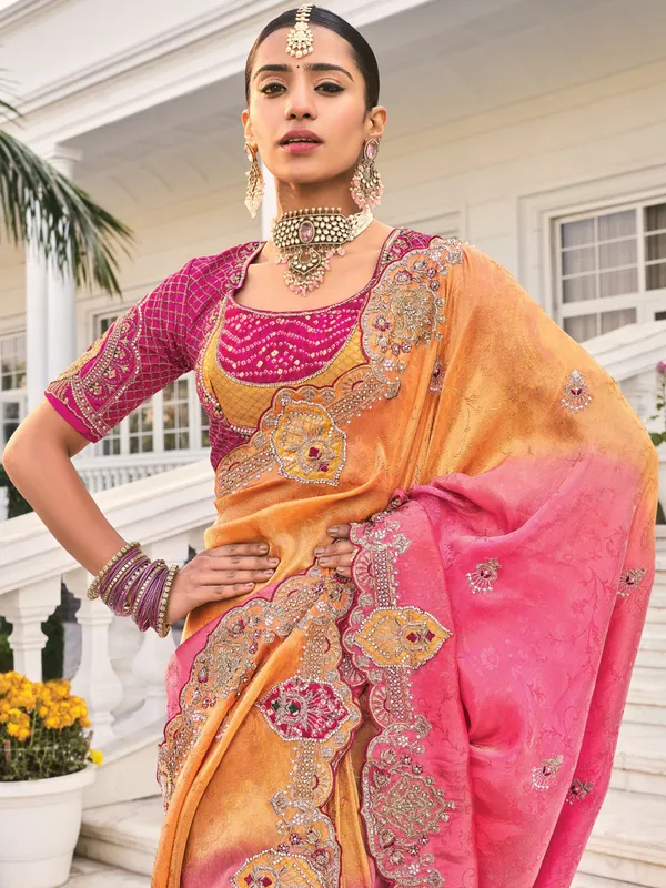 Orange rani crape saree for grand celebrations
