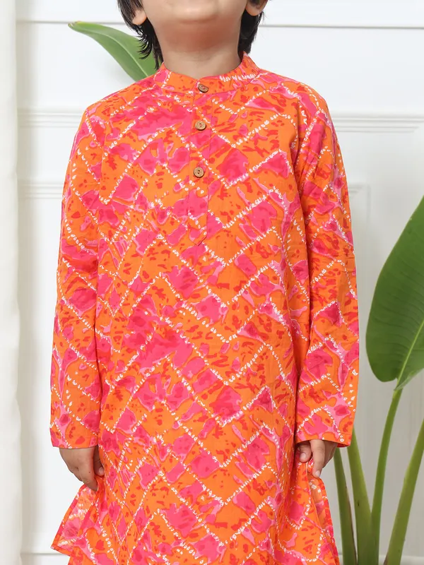 Orange shaded printed cotton kurta suit