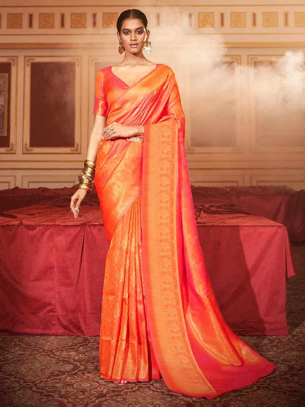 Orange shaded silk wedding look saree
