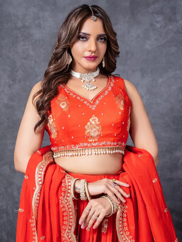 Orange silk lehenga choli for special ocassions