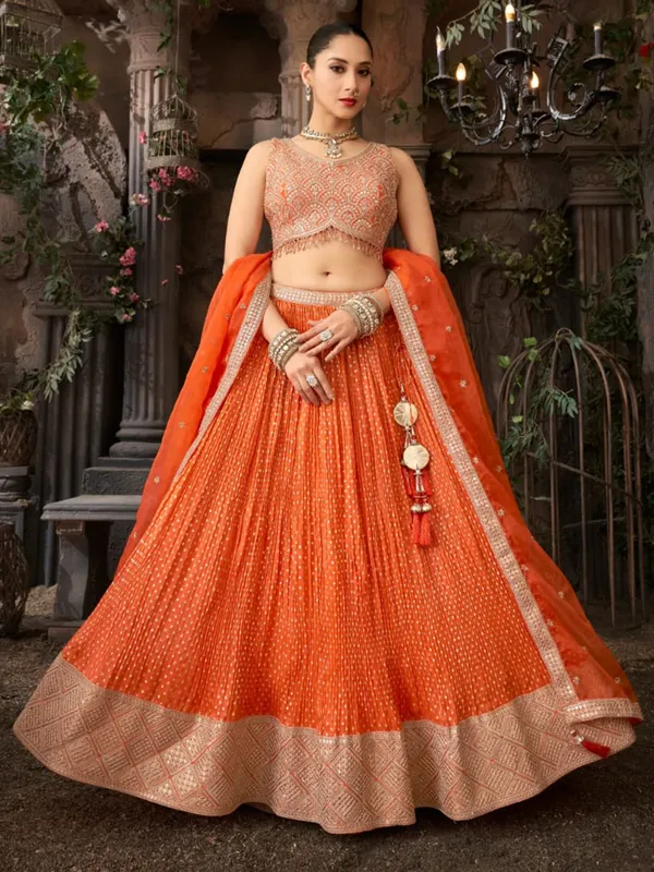 Orange silk lehenga choli with cutdana resham work