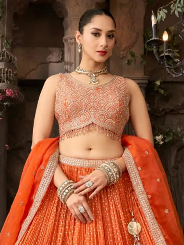 Orange silk lehenga choli with cutdana resham work
