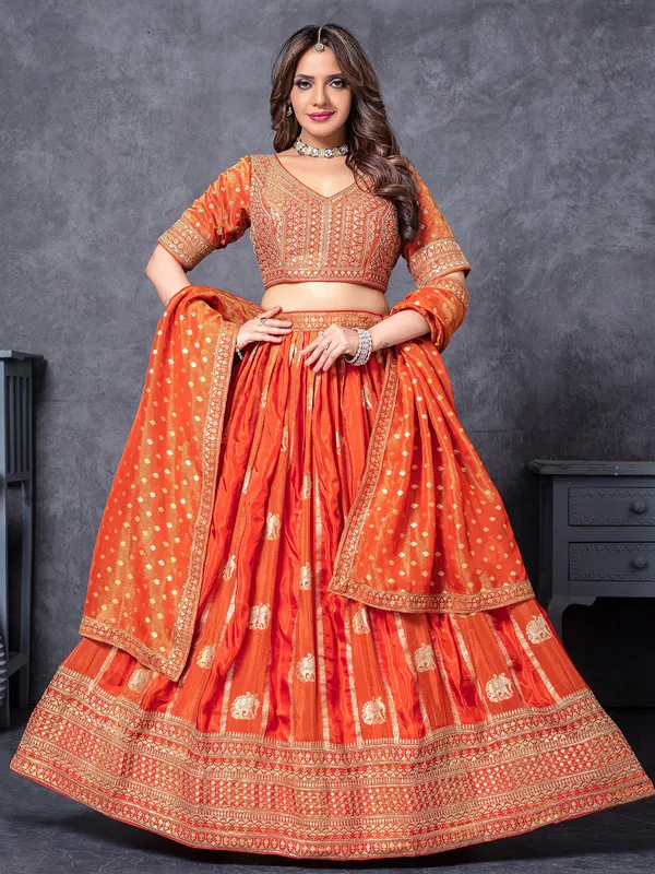 Orange silk lehenga choli with zari work