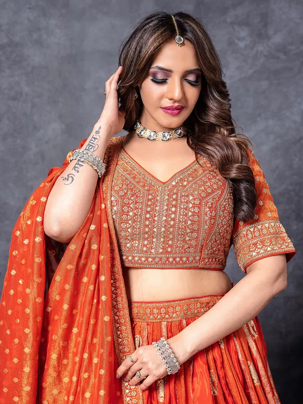 Orange silk lehenga choli with zari work