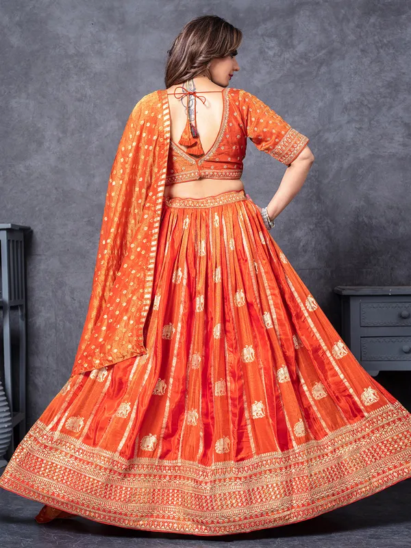 Orange silk lehenga choli with zari work