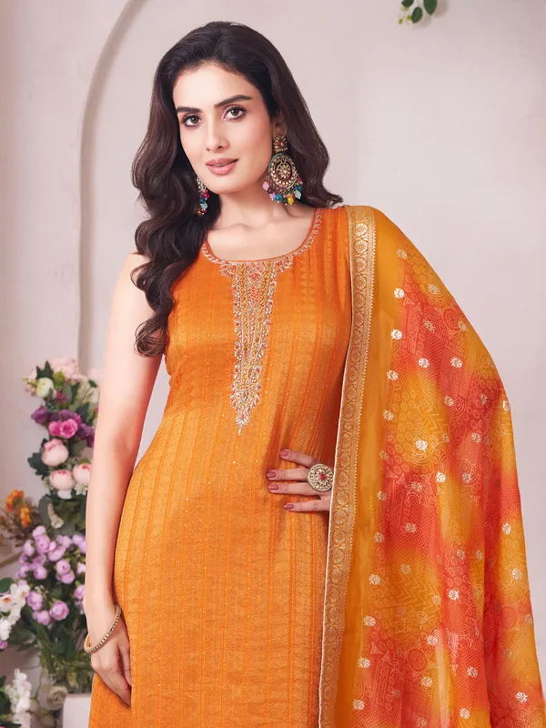 Orange silk mirror and zardosi work salwar suit