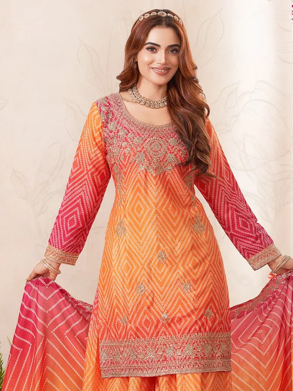 Orange silk palazzo suit with bandhani print