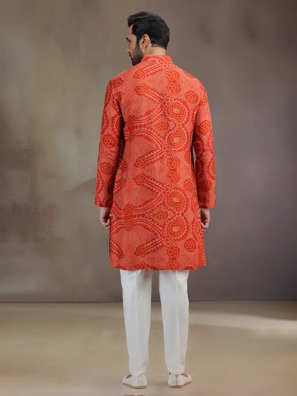 Orange silk printed men kurta pajama