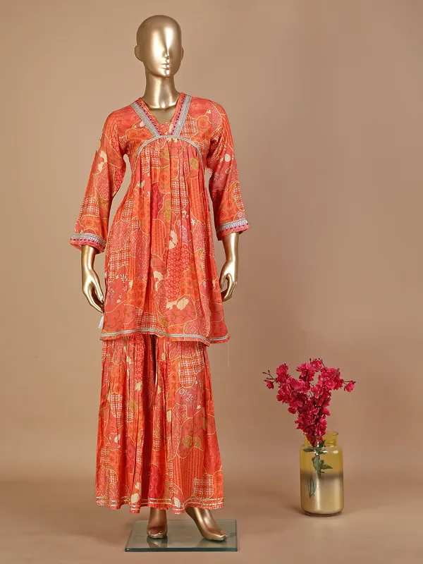 Orange silk printed sharara suit