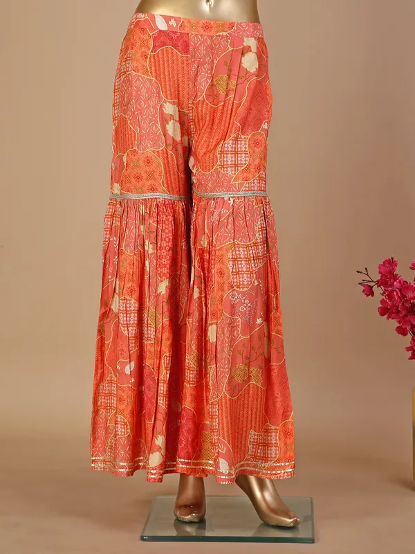 Orange silk printed sharara suit