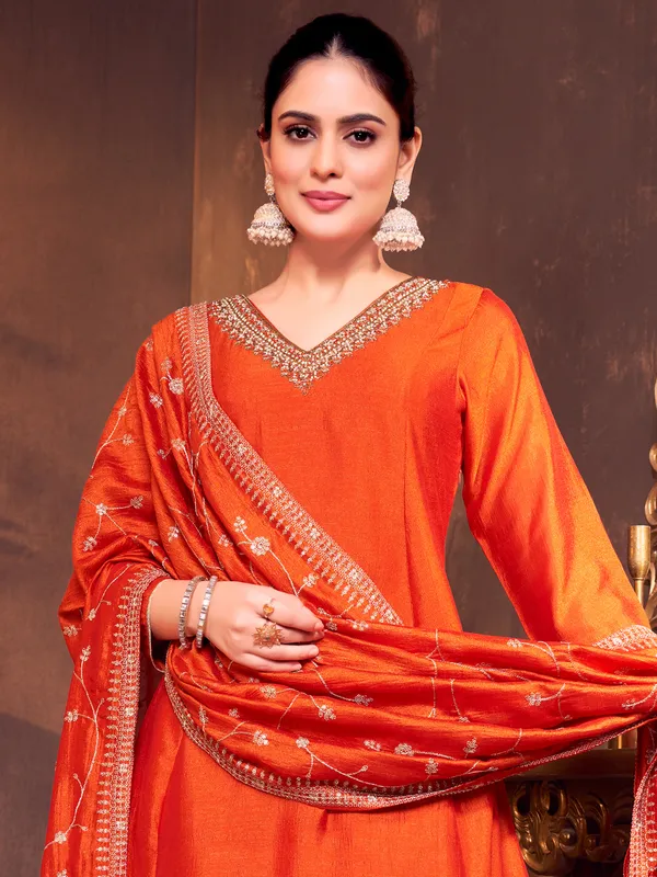 Orange silk salwar suit with dupatta