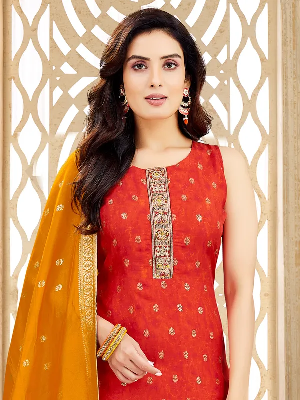 Orange silk salwar suit with zardosi and thread shine