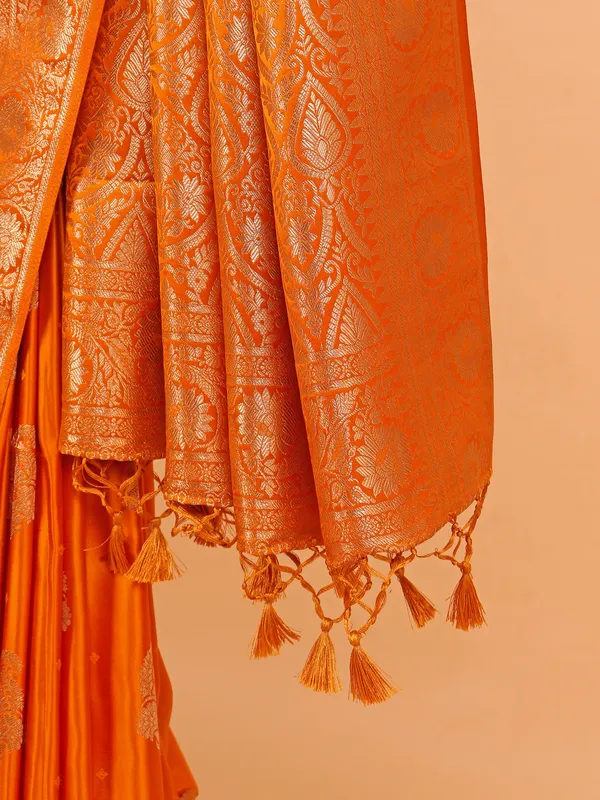 Orange silk saree for festive in zari weaving