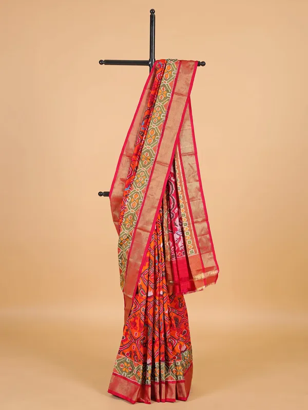 Orange silk saree in bandhej print