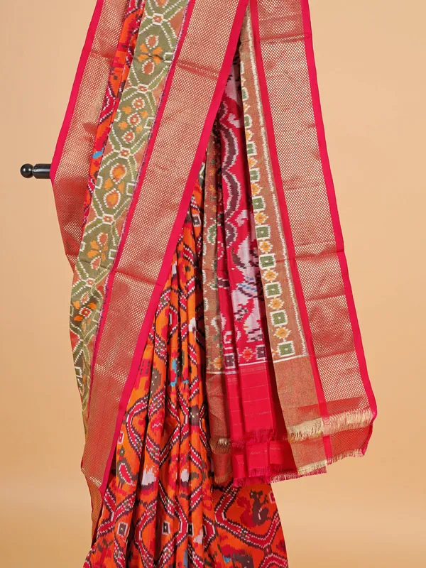 Orange silk saree in bandhej print