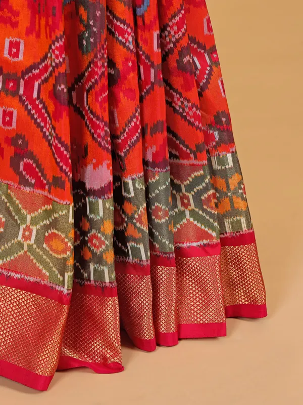 Orange silk saree in bandhej print