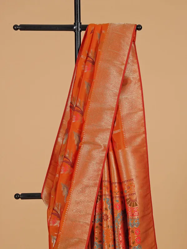 Orange silk saree with slluring motifs