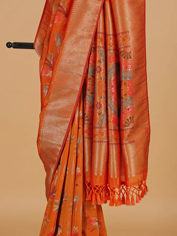 Orange silk saree with slluring motifs